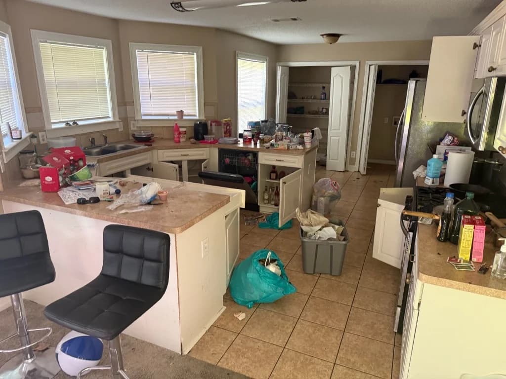 Kitchen before a house cleanout by Famous Hauling & Service